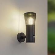 Lindby utomhusvägglampa Heulo, Ø 10,5 cm, rökgrå, sensor