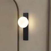 Lindby vägglampa till bad Tavrik, svart/vit, höjd 30 cm, glas