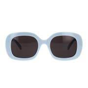 Celine Geometriska solglasögon med blank blå ram och grå organiska lin...