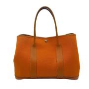 Hermès Vintage Pre-owned Canvas handvskor Orange, Dam