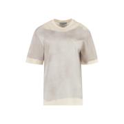 Prada Uppgradera din avslappnade garderob med en distressed T-shirt Gr...