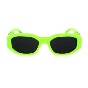 Versace Solglasögon med oregelbunden form i fluorescerande grönt och m...