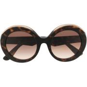 Dolce & Gabbana Stiliga solglasögon med brun/hawaiiansk ram och ovala ...