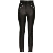 Dolce & Gabbana Svarta leggings i konstläder med dragkedjefickor Black...