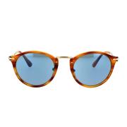 Persol Unika och exklusiva solglasögon med brunrandig båge och blåa li...