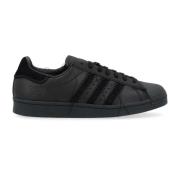 Y-3 Svart läder Superstar sneaker med fransiga detaljer Black, Herr