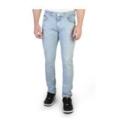 Tommy Hilfiger Slim Fit Jeans i enfärgad med knapp och dragkedja Blue,...