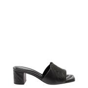 Alexander McQueen Svarta platta sandaler i metalliskt läder Black, Dam