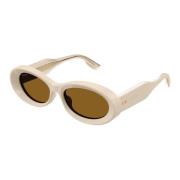 Gucci Stiliga ovala solglasögon med ikoniska nitar Beige, Unisex