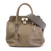 Hermès Vintage Pre-owned Tyg handvskor Beige, Dam