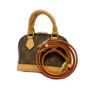 Louis Vuitton Vintage Pre-owned Tyg louis-vuitton-vskor Brown, Dam