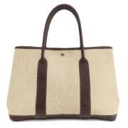 Hermès Vintage Pre-owned Tyg handvskor Beige, Dam