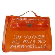 Hermès Vintage Pre-owned Vinyl handvskor Orange, Dam