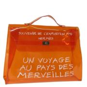 Hermès Vintage Pre-owned Vinyl handvskor Orange, Dam