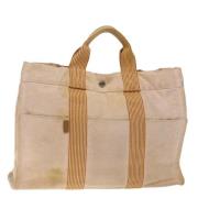 Hermès Vintage Pre-owned Canvas handvskor Beige, Dam