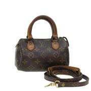 Louis Vuitton Vintage Pre-owned Canvas handvskor Brown, Dam