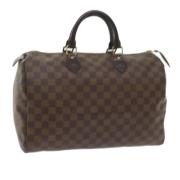 Louis Vuitton Vintage Pre-owned Canvas handvskor Brown, Dam