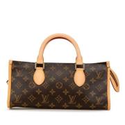 Louis Vuitton Vintage Pre-owned Plast handvskor Brown, Dam