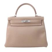 Hermès Vintage Pre-owned Laeder handvskor Beige, Dam