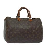 Louis Vuitton Vintage Pre-owned Canvas handvskor Brown, Dam