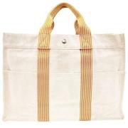 Hermès Vintage Pre-owned Canvas handvskor Beige, Dam