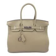 Hermès Vintage Pre-owned Laeder handvskor Beige, Dam