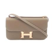 Hermès Vintage Pre-owned Tyg axelremsvskor Gray, Dam