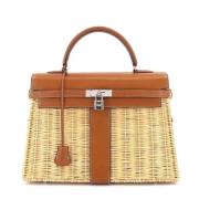 Hermès Vintage Pre-owned Laeder handvskor Beige, Dam