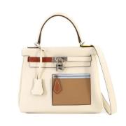 Hermès Vintage Pre-owned Laeder handvskor Beige, Dam