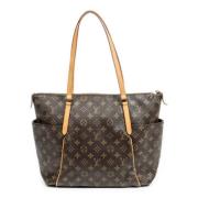 Louis Vuitton Vintage Pre-owned Belagd canvas axelremsvskor Brown, Dam