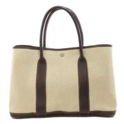 Hermès Vintage Pre-owned Tyg handvskor Beige, Dam