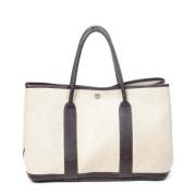 Hermès Vintage Pre-owned Belagd canvas handvskor Beige, Dam