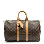 Louis Vuitton Vintage Pre-owned Belagd canvas handvskor Brown, Dam