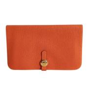 Hermès Vintage Pre-owned Laeder kuvertvskor Orange, Dam