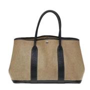 Hermès Vintage Pre-owned Canvas handvskor Beige, Dam