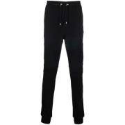 Balmain Svarta bomullsjoggingbyxor med flocktryck Black, Herr