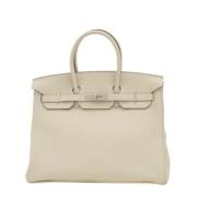 Hermès Vintage Pre-owned Laeder handvskor Beige, Dam