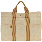 Hermès Vintage Pre-owned Canvas handvskor Beige, Dam