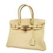 Hermès Vintage Pre-owned Laeder handvskor Beige, Dam