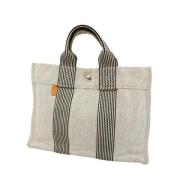 Hermès Vintage Pre-owned Canvas handvskor Beige, Dam