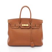 Hermès Vintage Pre-owned Laeder handvskor Brown, Dam