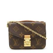 Louis Vuitton Vintage Pre-owned Canvas axelremsvskor Brown, Dam