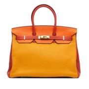 Hermès Vintage Pre-owned Laeder handvskor Orange, Dam