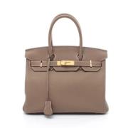 Hermès Vintage Pre-owned Laeder handvskor Beige, Dam