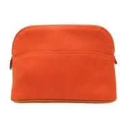 Hermès Vintage Pre-owned Canvas kuvertvskor Orange, Dam