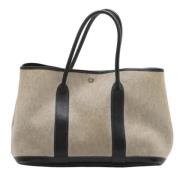 Hermès Vintage Pre-owned Canvas handvskor Beige, Dam