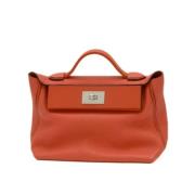 Hermès Vintage Pre-owned Laeder handvskor Orange, Dam