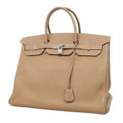 Hermès Vintage Pre-owned Laeder handvskor Beige, Dam