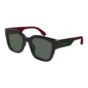 Gucci Stiliga solglasögon med en twist Black, Unisex